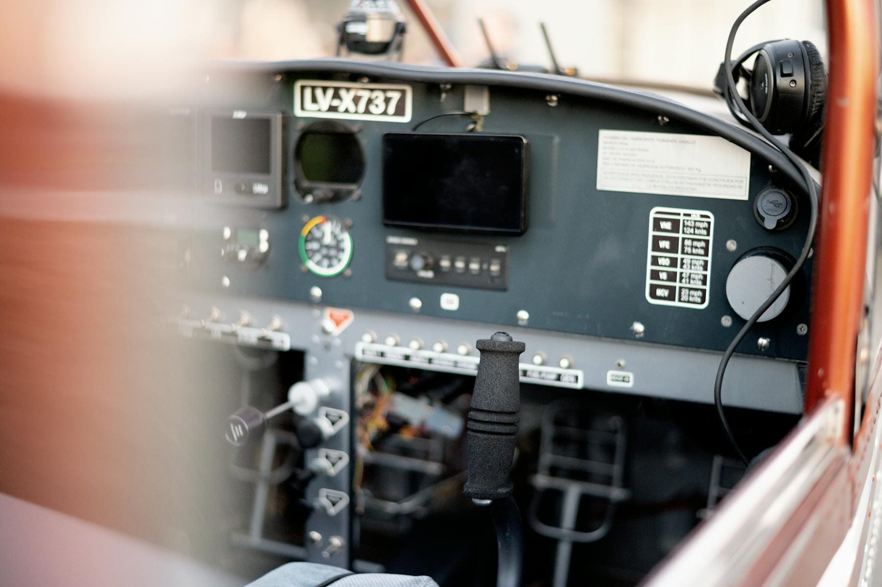 Close-up of a small aircraft instrument panel and controls